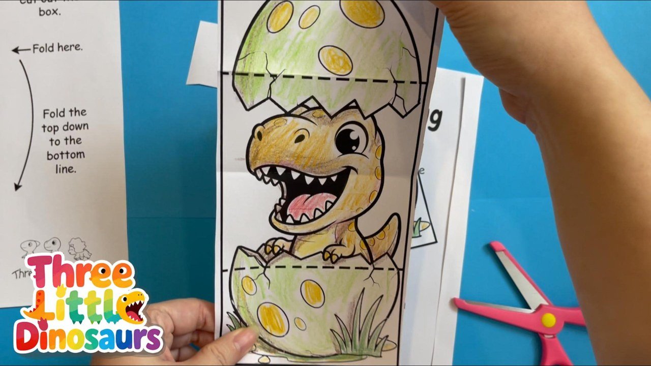 T-Rex egg craft printable on a craft table