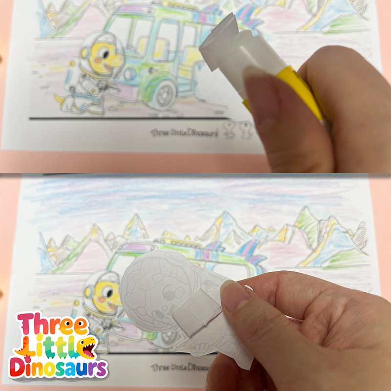 Real folded paper tabs that create depth in the dinosaur space craft